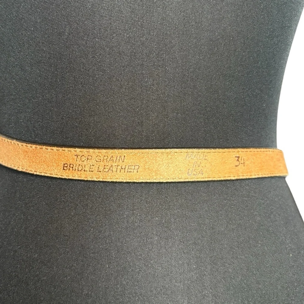 Vintage‎ leather music buckle belt. Made in the US. In good used condition